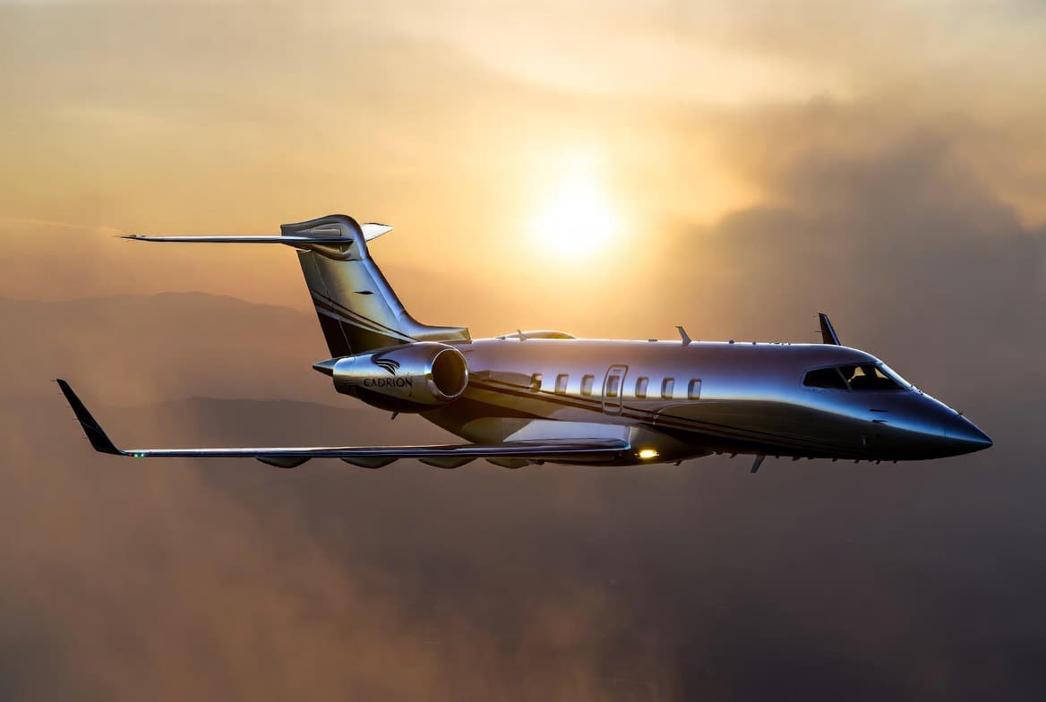 Dark private aircraft positioned on an executive apron